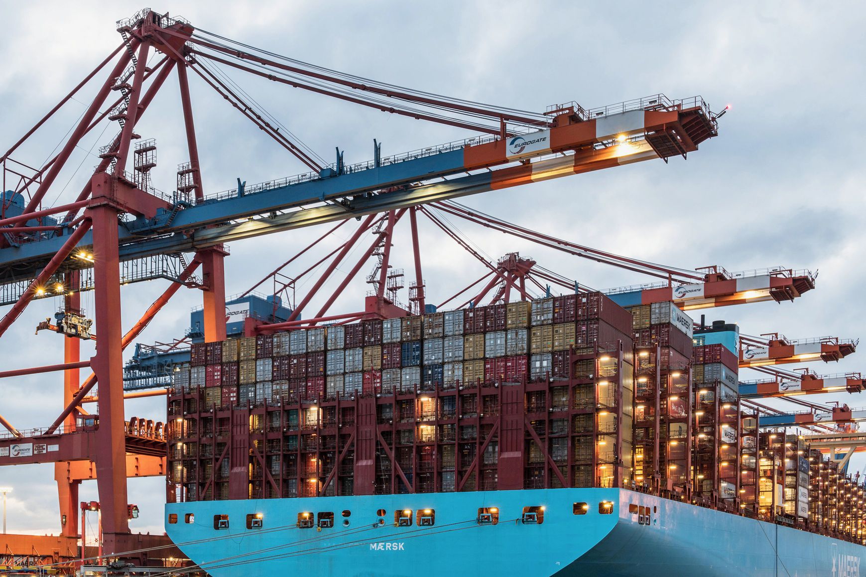 Large container ship sailing through open ocean