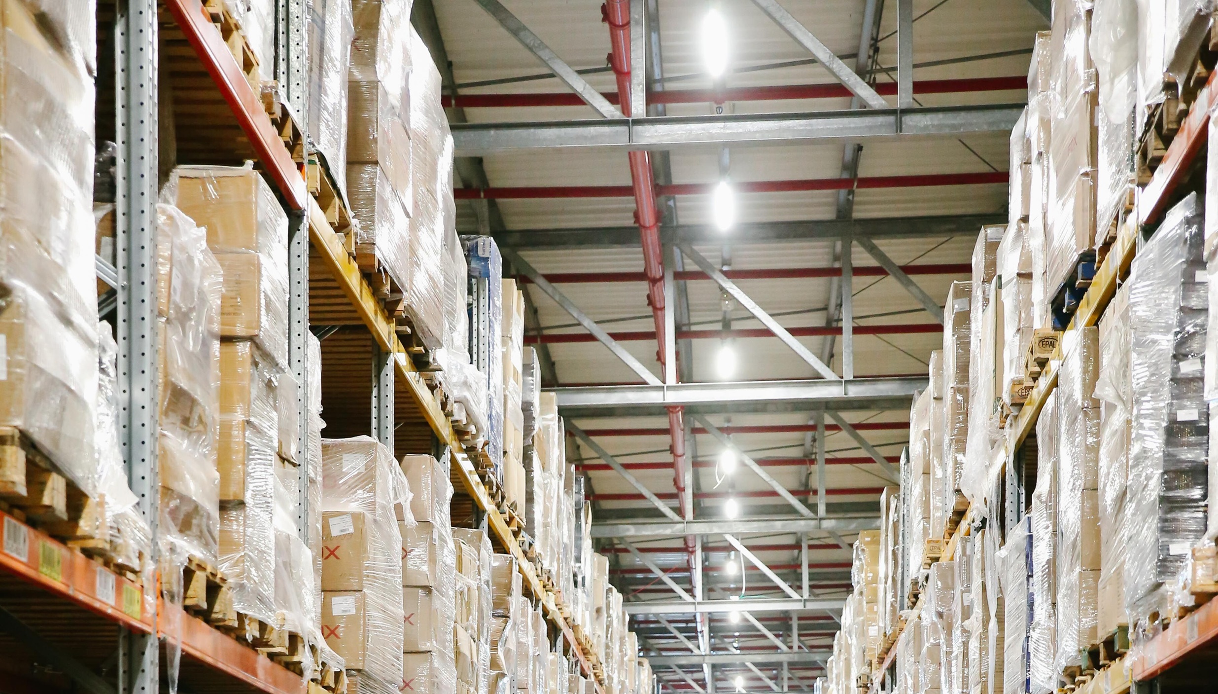 Large modern warehouse facility with organised storage