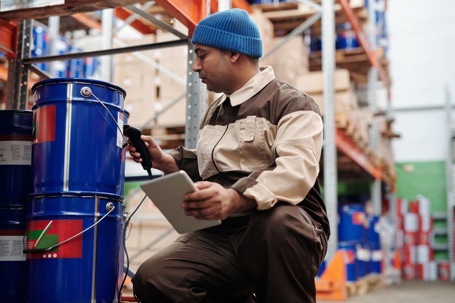 Logistics worker handling packaged goods